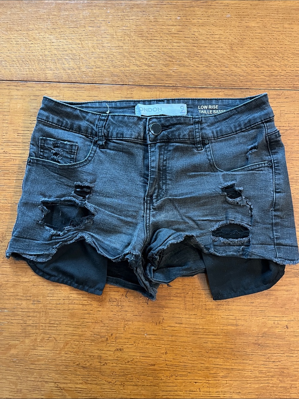LONDONJEAN Black Low-Rise Distressed Denim Shorts